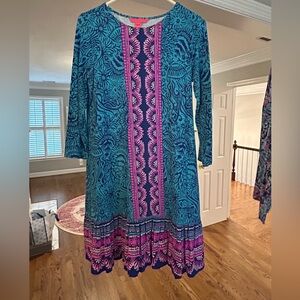 Lilly Pulitzer size small stretchy dress with cute ruffle hem at bottom. EUC
